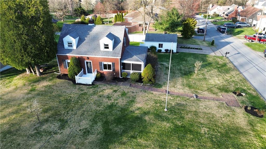2936 Brodhead Road Aliquippa, PA 15001 - Photo 45 of 47 an aerial view of a house with swimming pool and porch