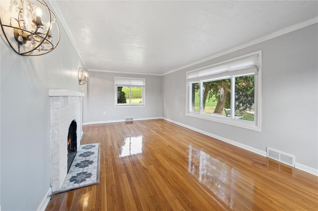 2936 Brodhead Road Aliquippa, PA 15001 - Photo 8 of 47 a view of empty room with wooden floor and fan