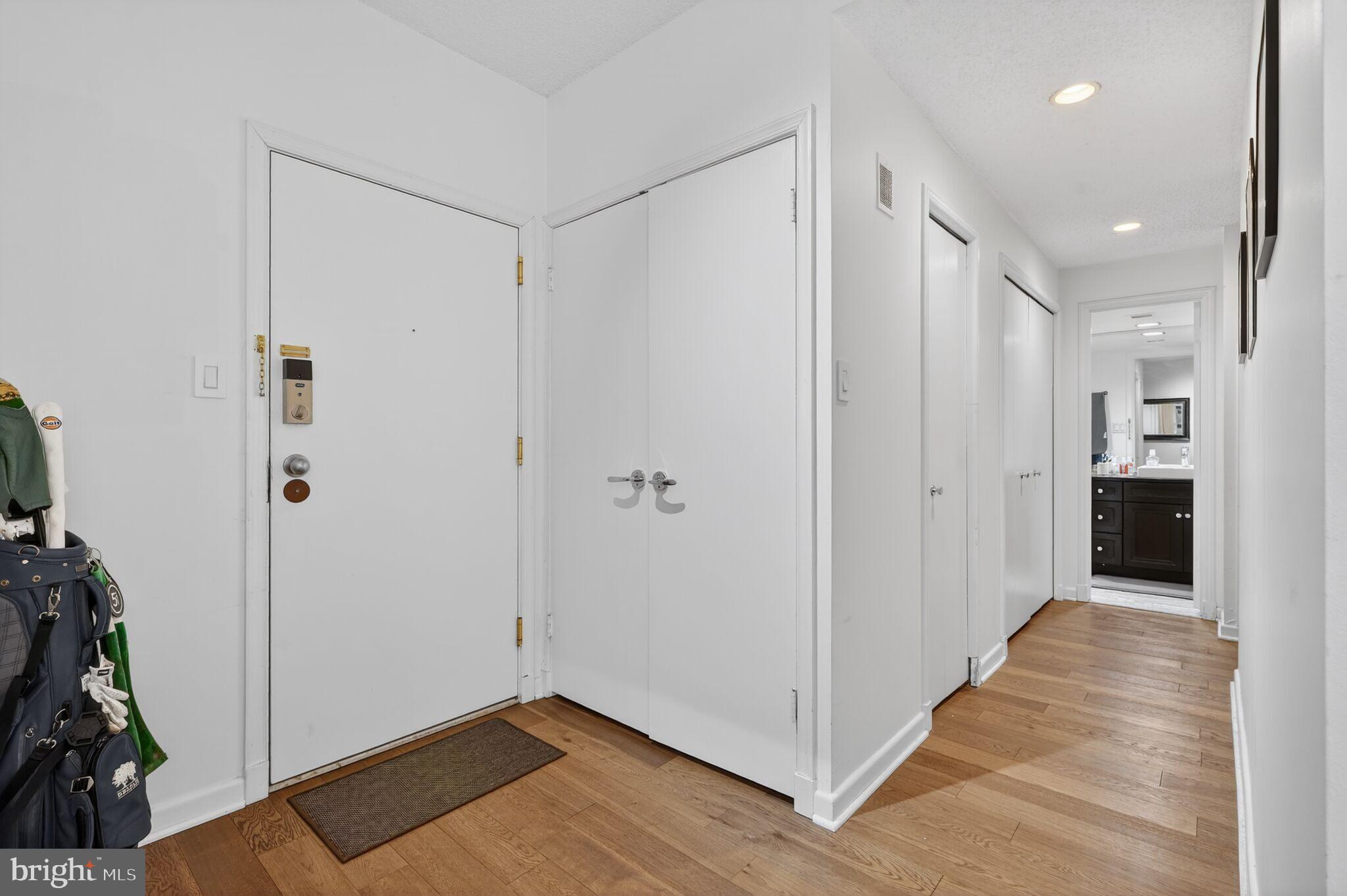 1045 31st Street Northwest, Unit 21 Washington, DC 20007 - Photo 12 of 35 a view of a hallway with wooden floor