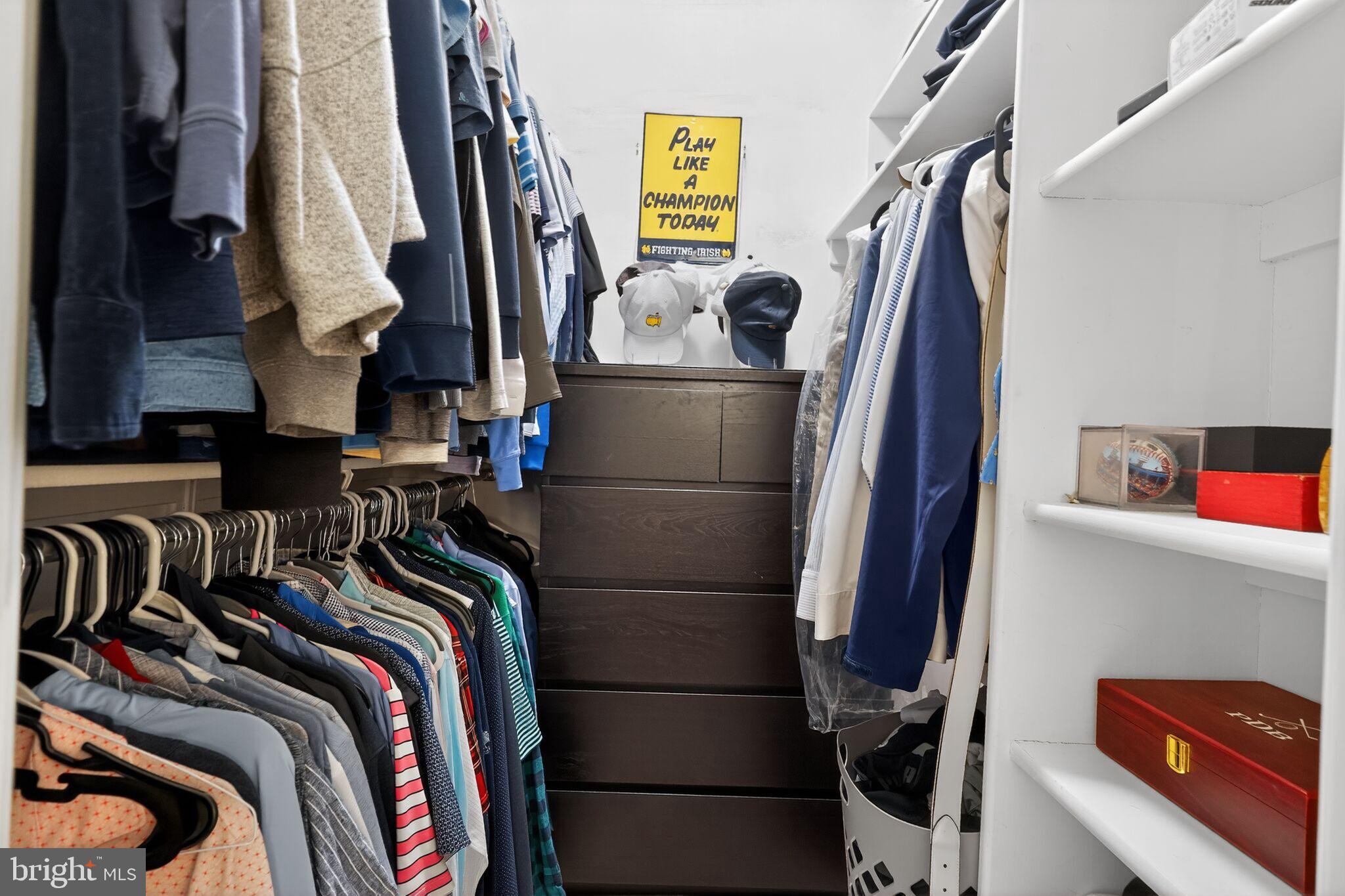 1045 31st Street Northwest, Unit 21 Washington, DC 20007 - Photo 15 of 35 a view of walk in closet with clothes and shoes