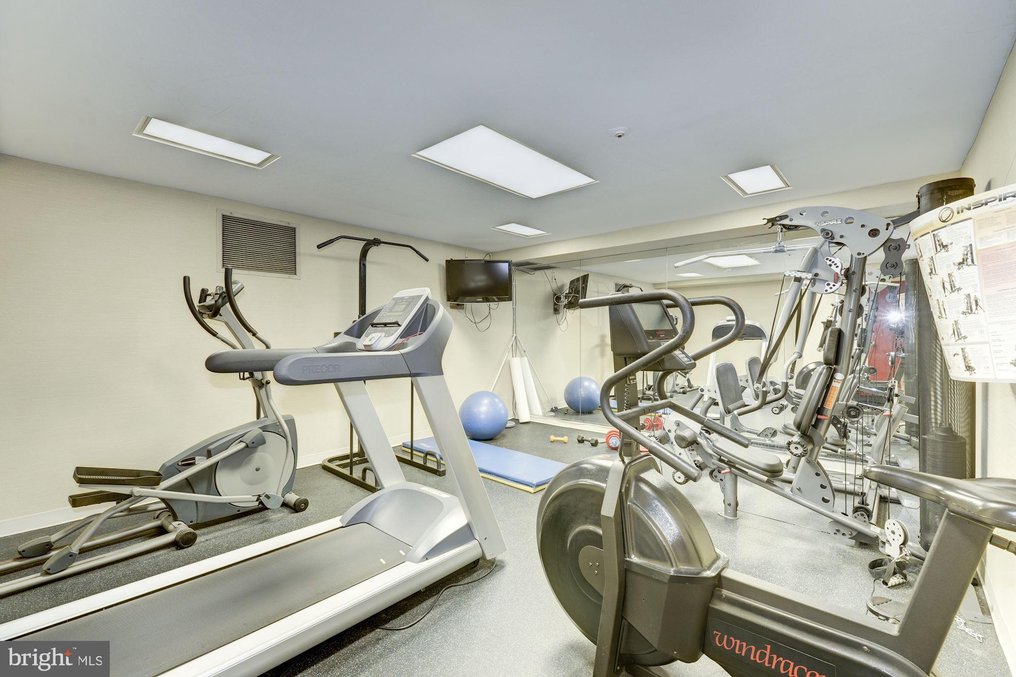 1045 31st Street Northwest, Unit 21 Washington, DC 20007 - Photo 31 of 35 a room with gym equipment