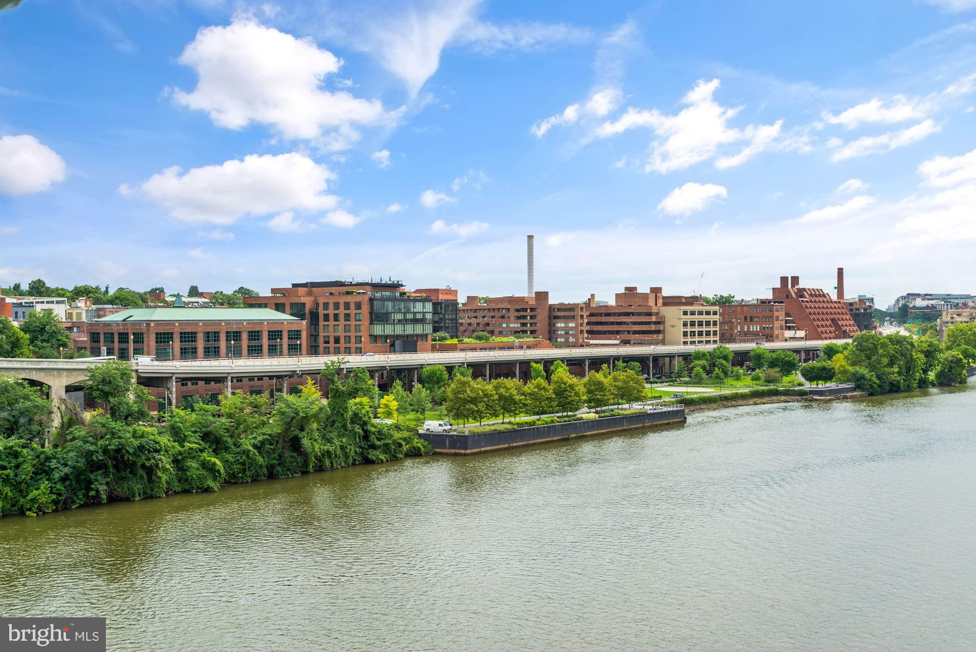 1045 31st Street Northwest, Unit 21 Washington, DC 20007 - Photo 32 of 35 a view of a lake with a city
