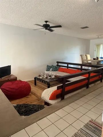 a kitchen with stainless steel appliances a stove a sink and a refrigerator