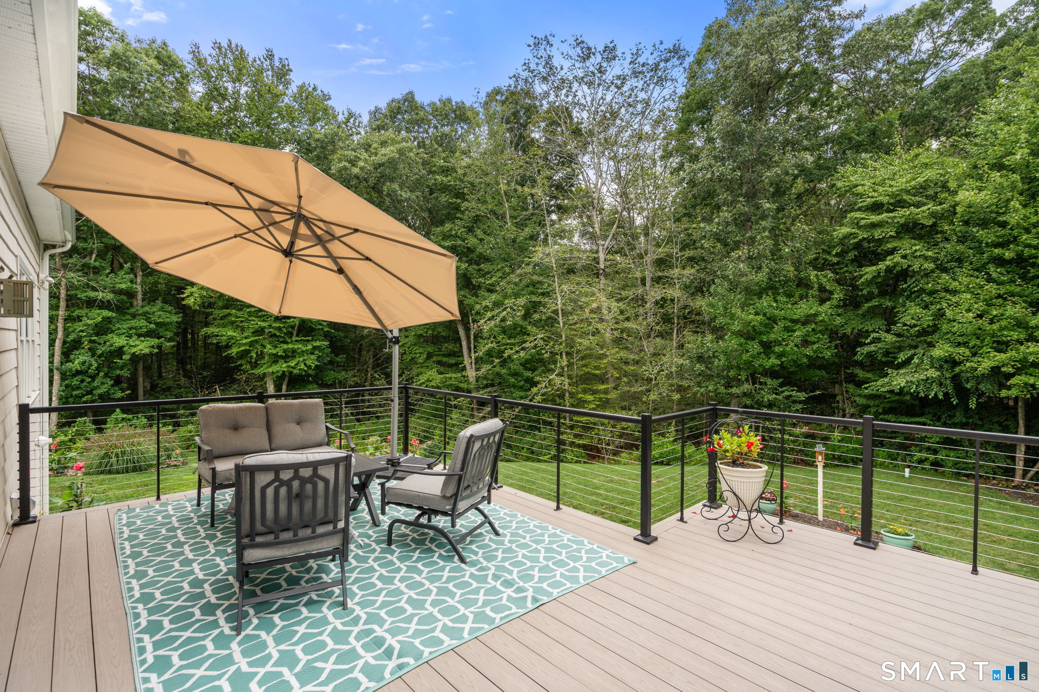 4 Autumn Ridge Westbrook, CT 06498 - Photo 26 of 31 The newly added deck offers modern finishes and durability.