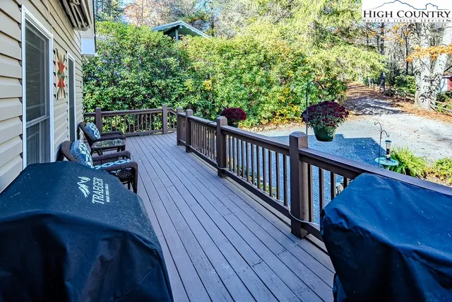 a view of balcony with wooden floor