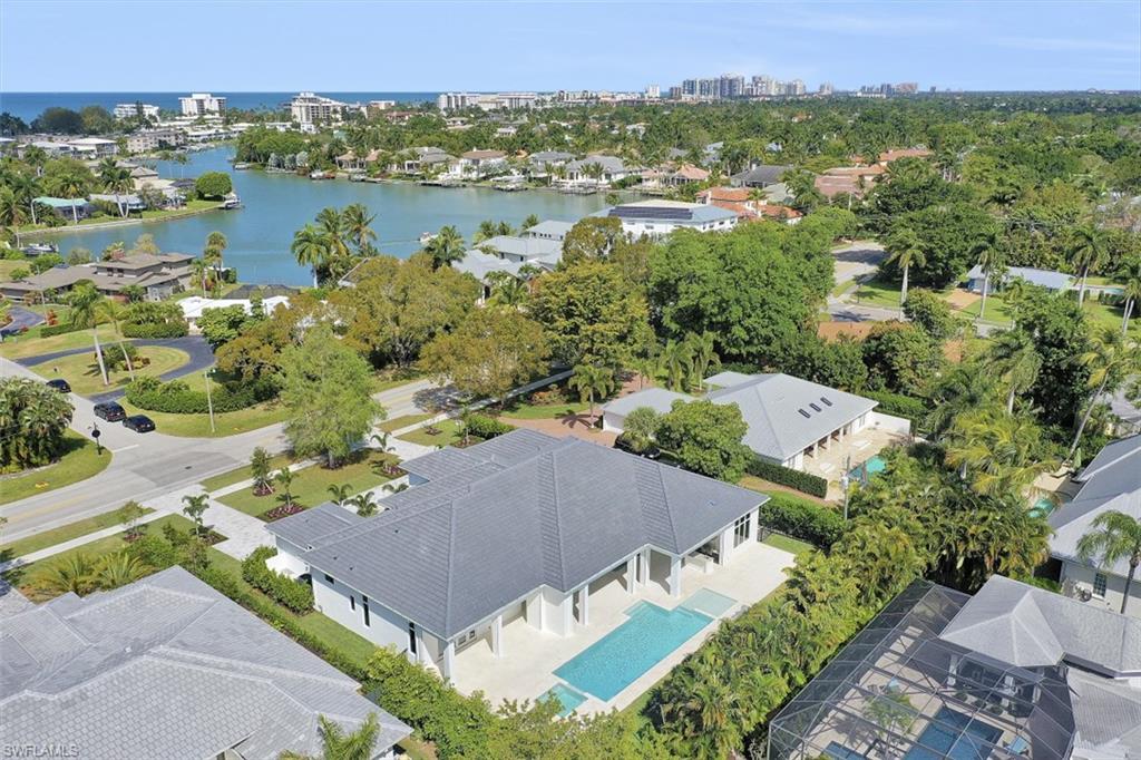 1670 Crayton Road Naples, FL 34102 - Photo 2 of 26 an aerial view of a city