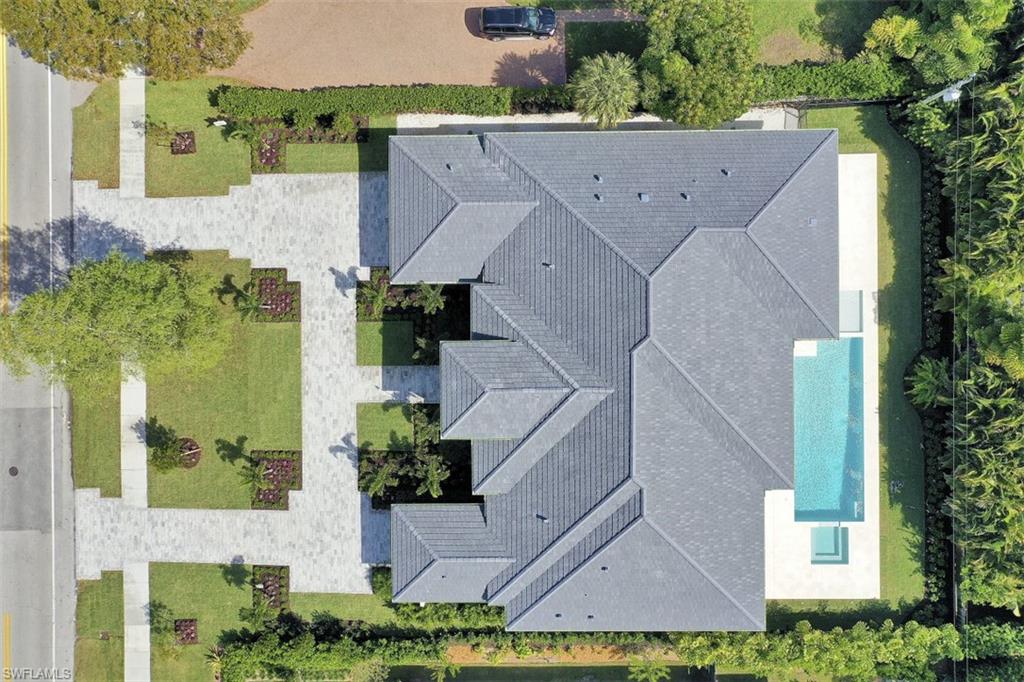 1670 Crayton Road Naples, FL 34102 - Photo 26 of 26 an aerial view of a house with a yard and large tree