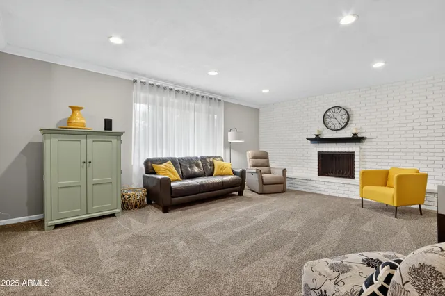 a living room with furniture and a couch