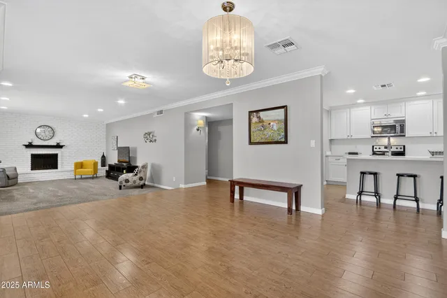 a bedroom with a bed and a ceiling fan