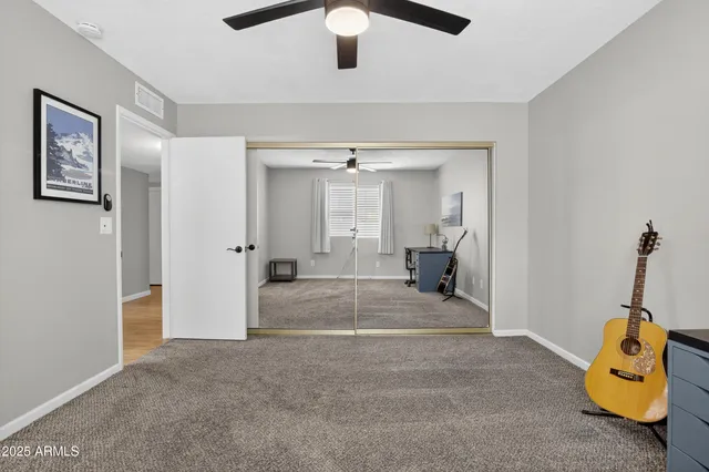a view of a garage with rack and bicycle