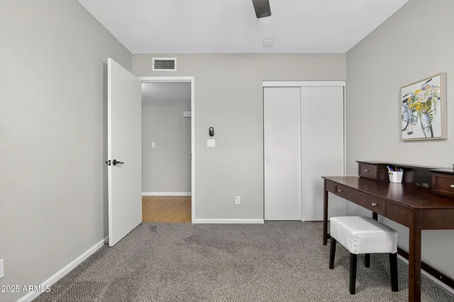 a view of two chairs in patio