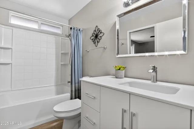 a view of a house with a yard and garage