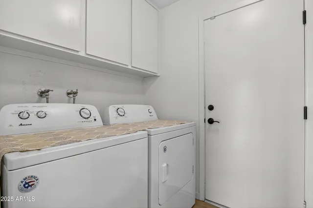 a front view of a house with swimming pool and furniture