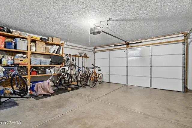 a building outdoor space with patio furniture and wooden floor