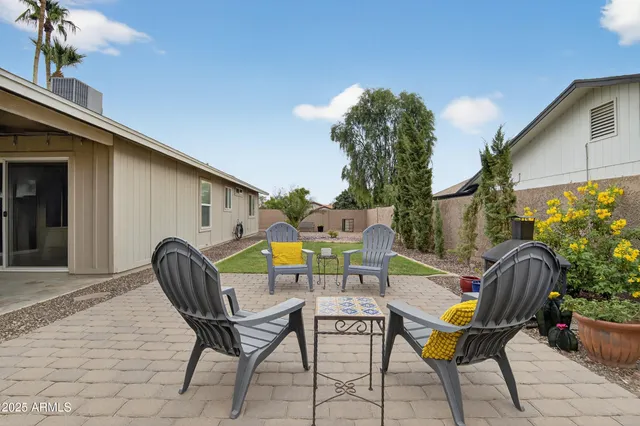 a view of a swimming pool with an outdoor space
