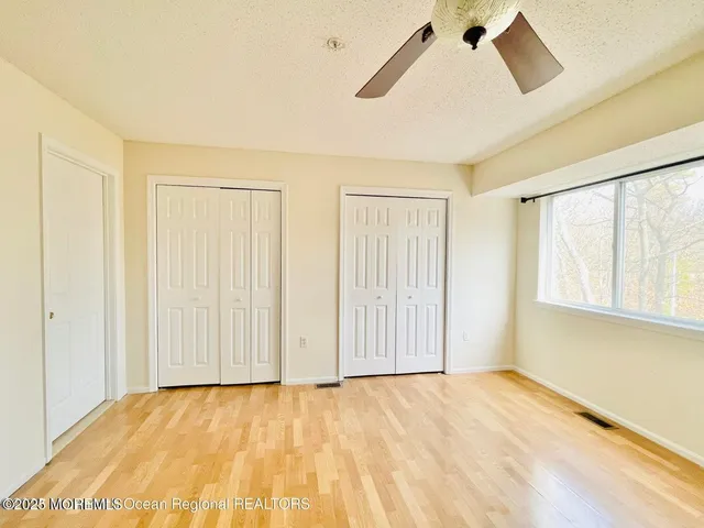 a bathroom with a toilet and shower