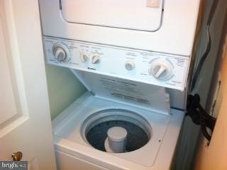 5758 Village Green Drive, Unit E Alexandria, VA 22309 - Photo 7 of 7 a utility room with dryer and washer
