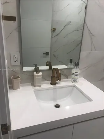 a close view of sink and a vanity