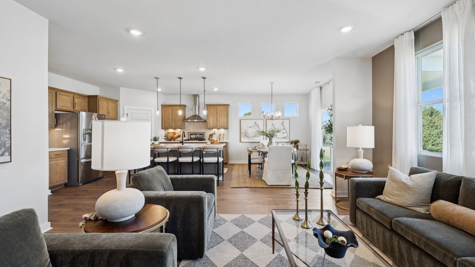 306 Harvest Point Boulevard Spring Hill, TN 37174 - Photo 28 of 70 a living room with furniture and a view of kitchen
