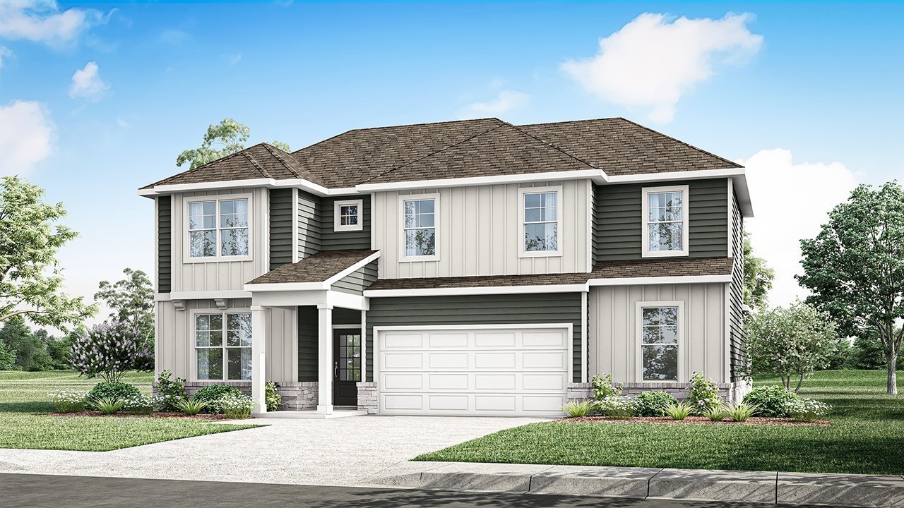 306 Harvest Point Boulevard Spring Hill, TN 37174 - Photo 3 of 70 a front view of a house with a yard and trees