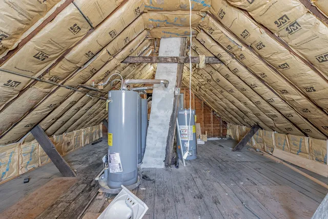 a view of a tall building with glass door