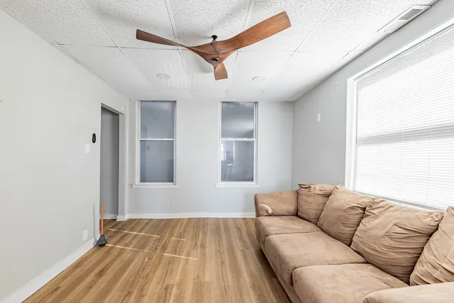 a kitchen with a sink stove and refrigerator