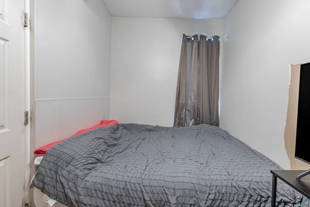 a view of a room with a fireplace