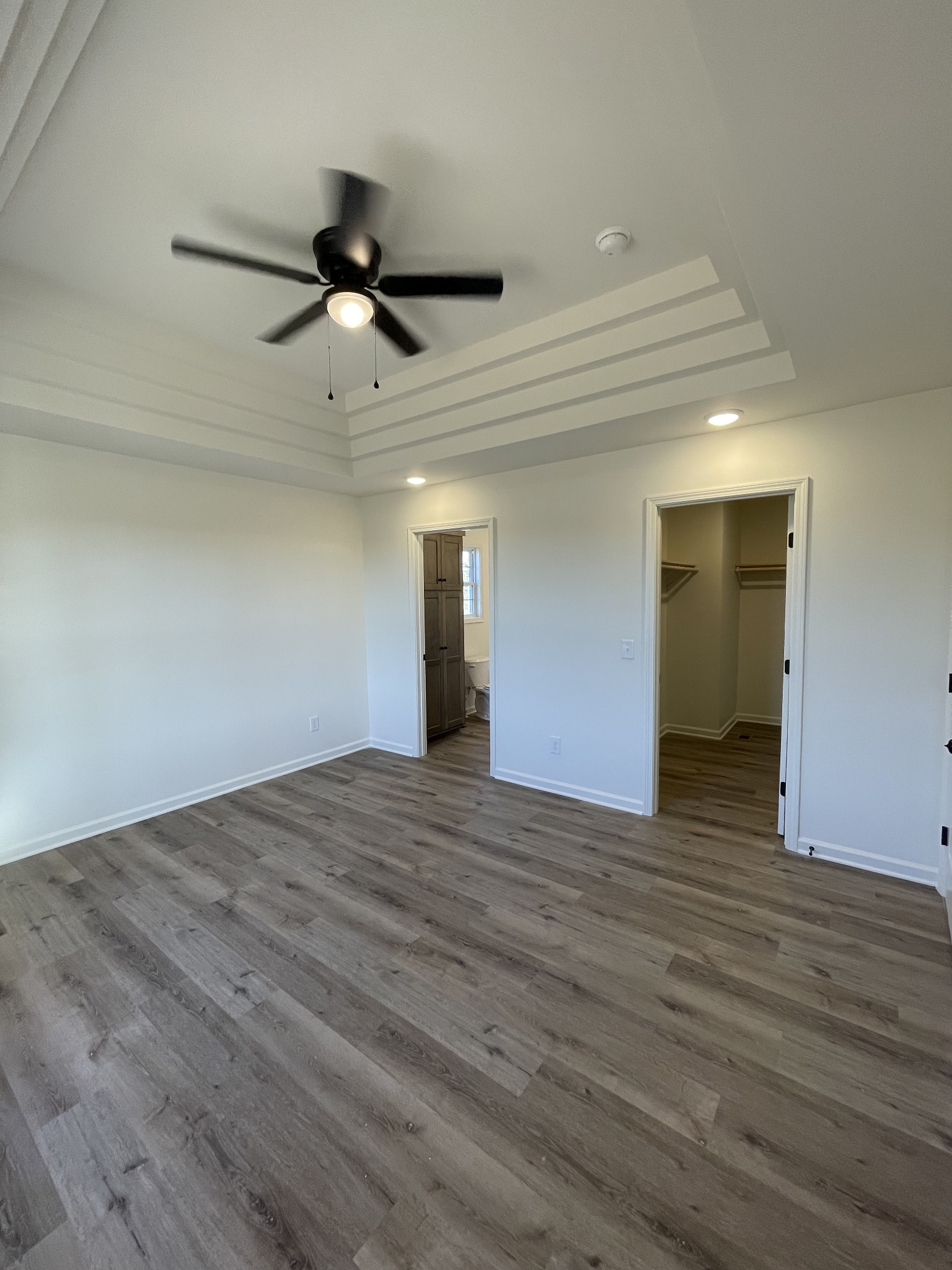 586 Pleasant Hill Road Lafayette, TN 37083 - Photo 19 of 38 a view of empty room with wooden floor