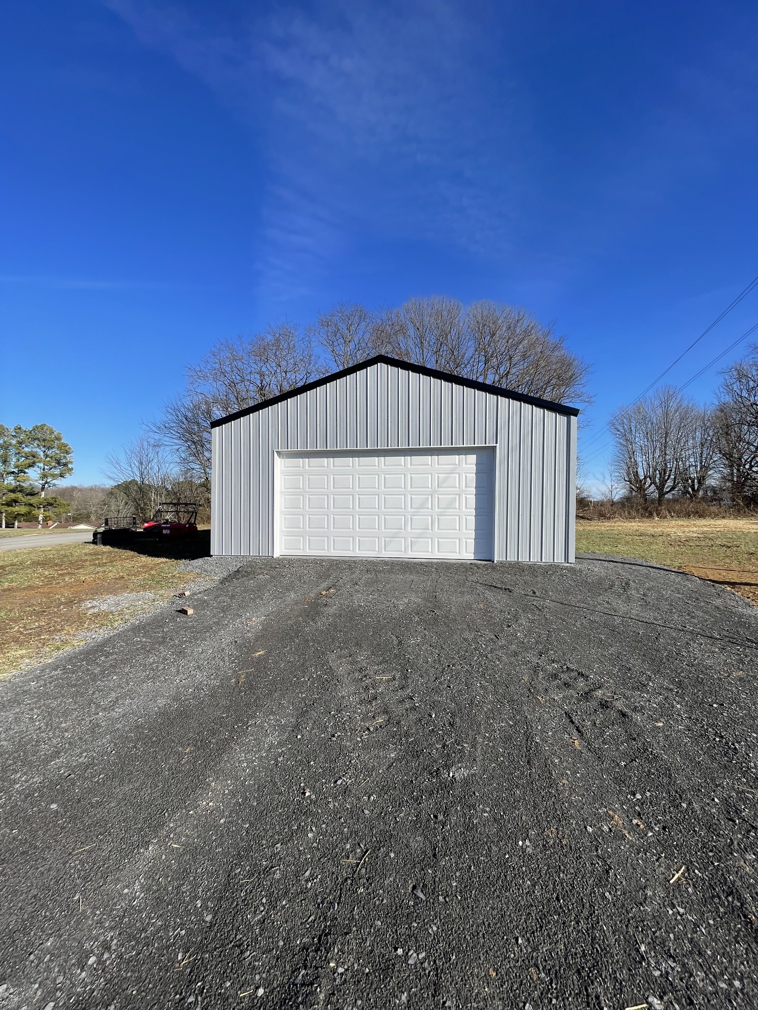 586 Pleasant Hill Road Lafayette, TN 37083 - Photo 37 of 38 a view of a house with a yard