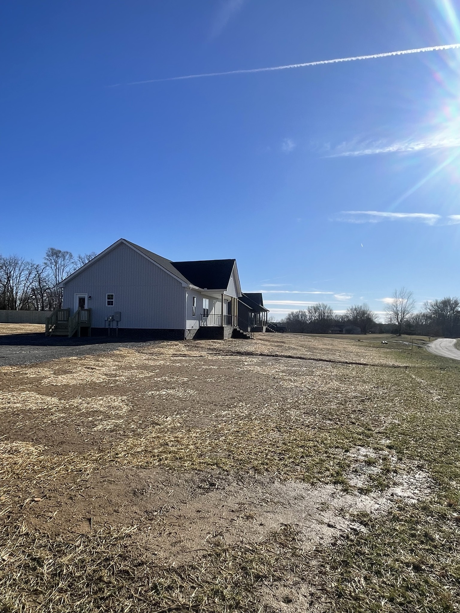 586 Pleasant Hill Road Lafayette, TN 37083 - Photo 8 of 38 a view of a terrace with a lake