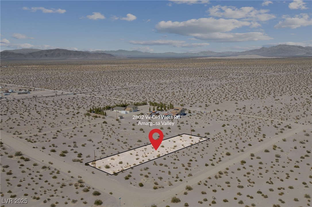 2972 West Old West Road Amargosa Valley, NV 89020 - Photo 19 of 59 Bird's eye view featuring view of desert and a mou