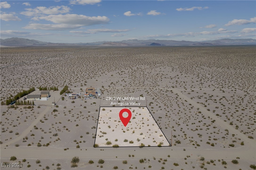 2972 West Old West Road Amargosa Valley, NV 89020 - Photo 20 of 59 Aerial view featuring view of desert and a mountai