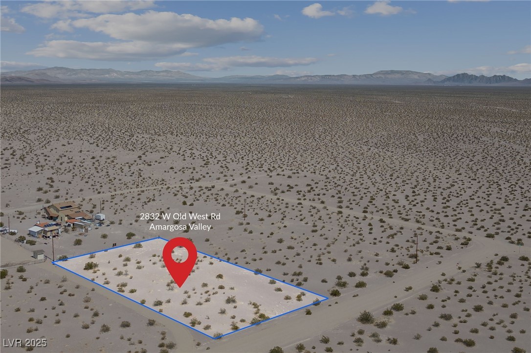 2972 West Old West Road Amargosa Valley, NV 89020 - Photo 24 of 59 Bird's eye view featuring a mountain view