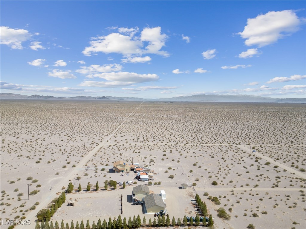2972 West Old West Road Amargosa Valley, NV 89020 - Photo 54 of 59 Birds eye view of property featuring a rural view,
