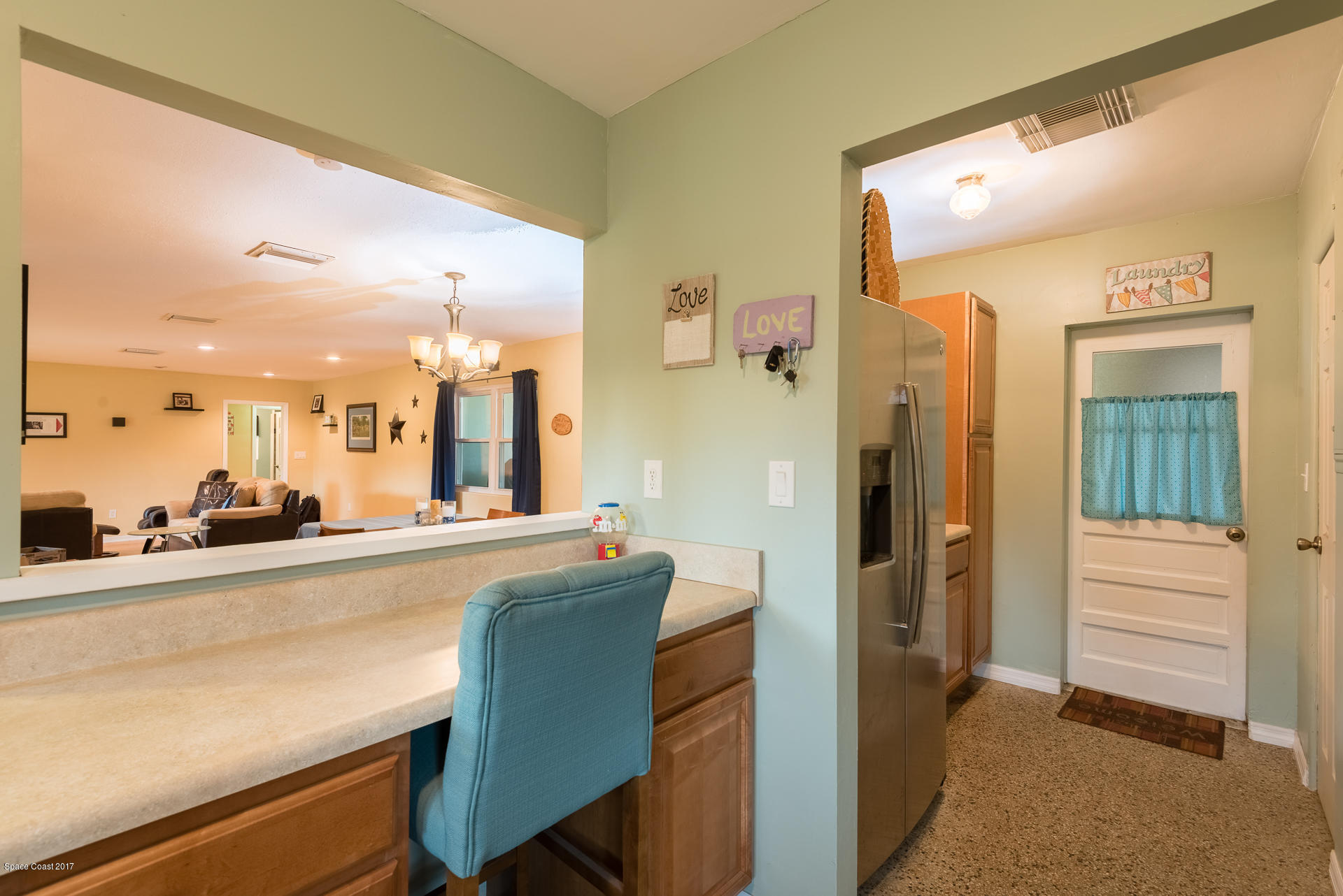 3635 Montgomery Road Mims, FL 32754 - Photo 14 of 19 a view of a living room and a window