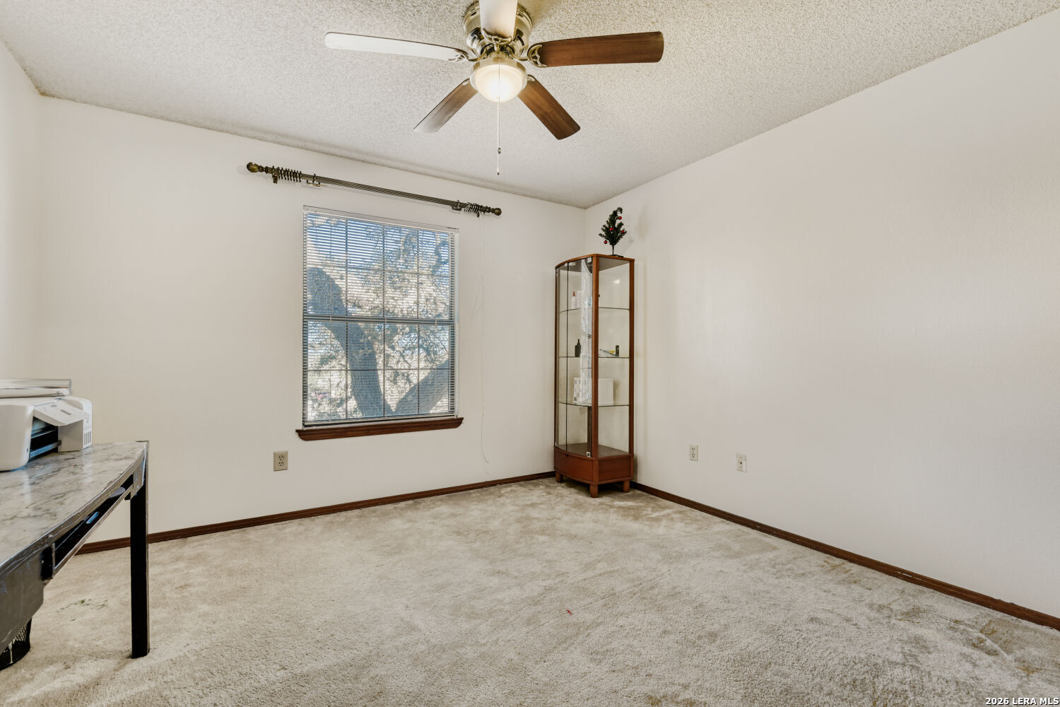 29342 Seabiscuit Drive Fair Oaks Ranch, TX 78015 - Photo 18 of 45 a view of an empty room with a window
