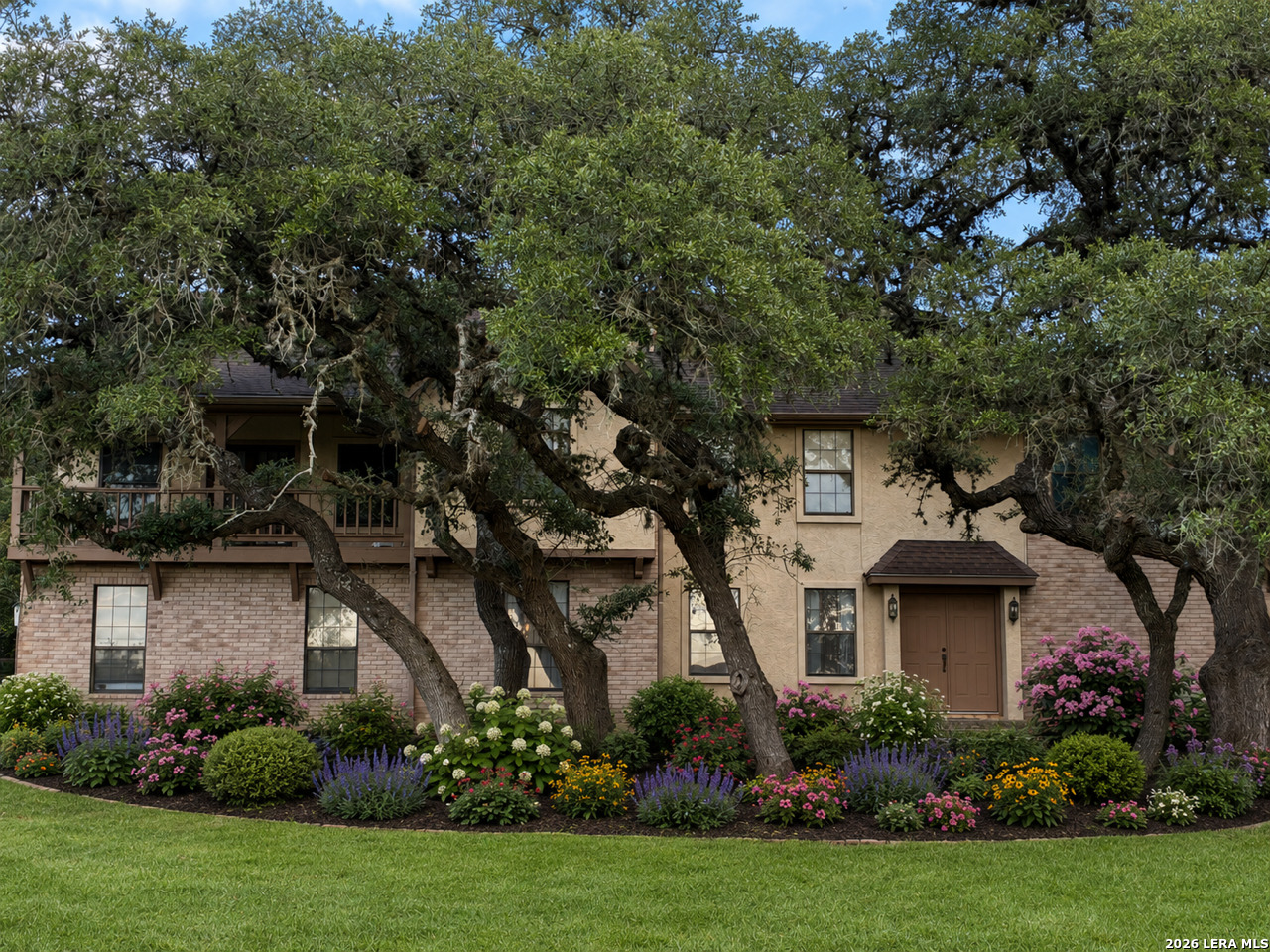 29342 Seabiscuit Drive Fair Oaks Ranch, TX 78015 - Photo 2 of 45 a front view of a house with a garden