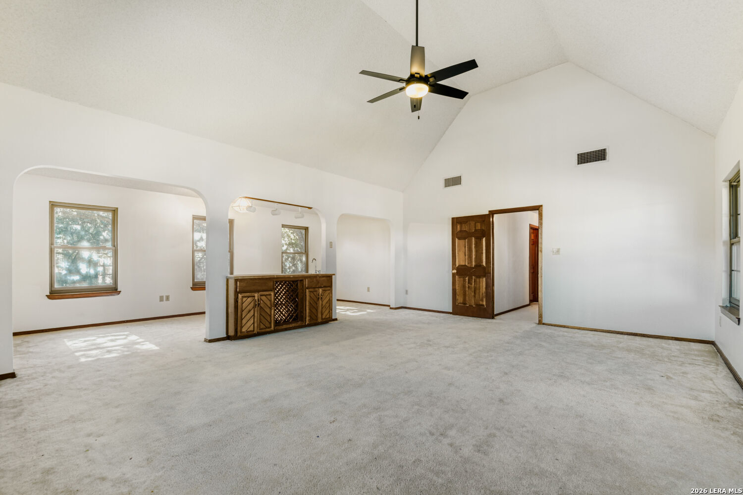 29342 Seabiscuit Drive Fair Oaks Ranch, TX 78015 - Photo 39 of 45 a big room with closet and a chandelier fan