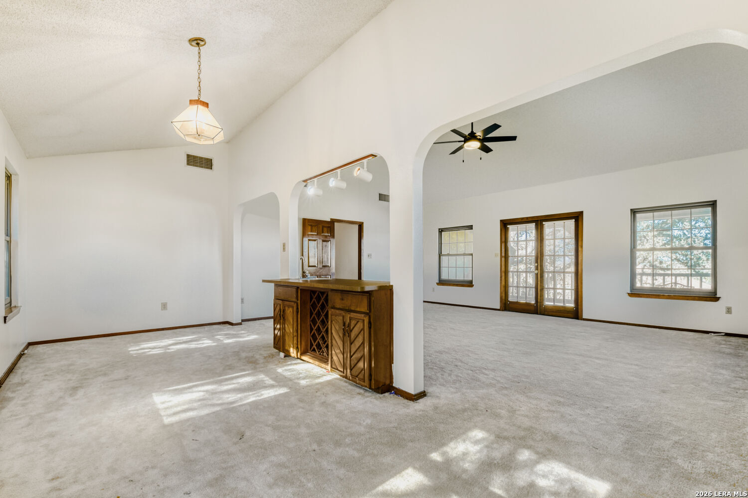29342 Seabiscuit Drive Fair Oaks Ranch, TX 78015 - Photo 40 of 45 an empty room with cabinet and windows