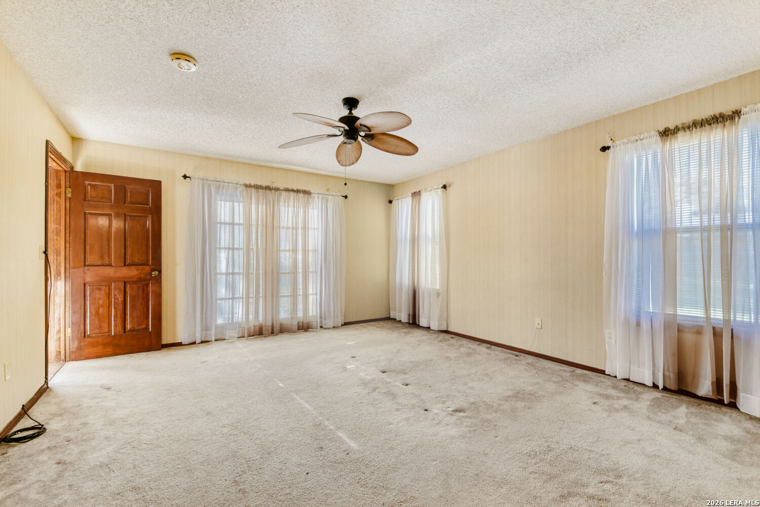 29342 Seabiscuit Drive Fair Oaks Ranch, TX 78015 - Photo 42 of 45 a view of empty room with ceiling fan