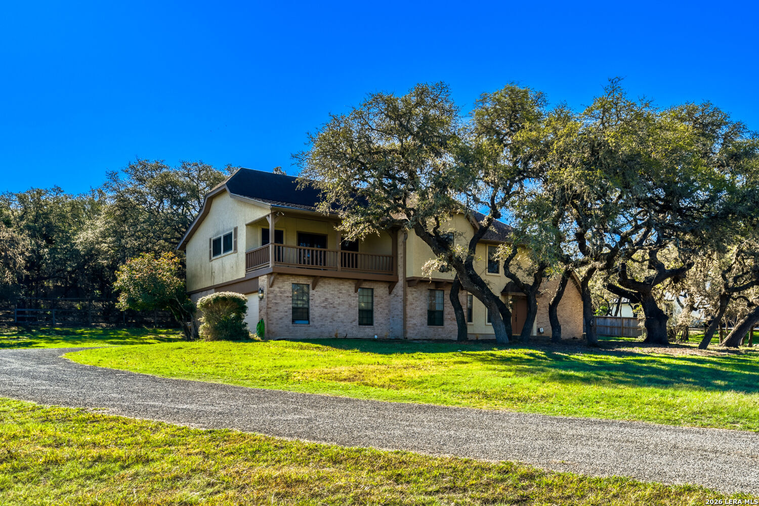 29342 Seabiscuit Drive Fair Oaks Ranch, TX 78015 - Photo 6 of 45 a view of a house with a yard