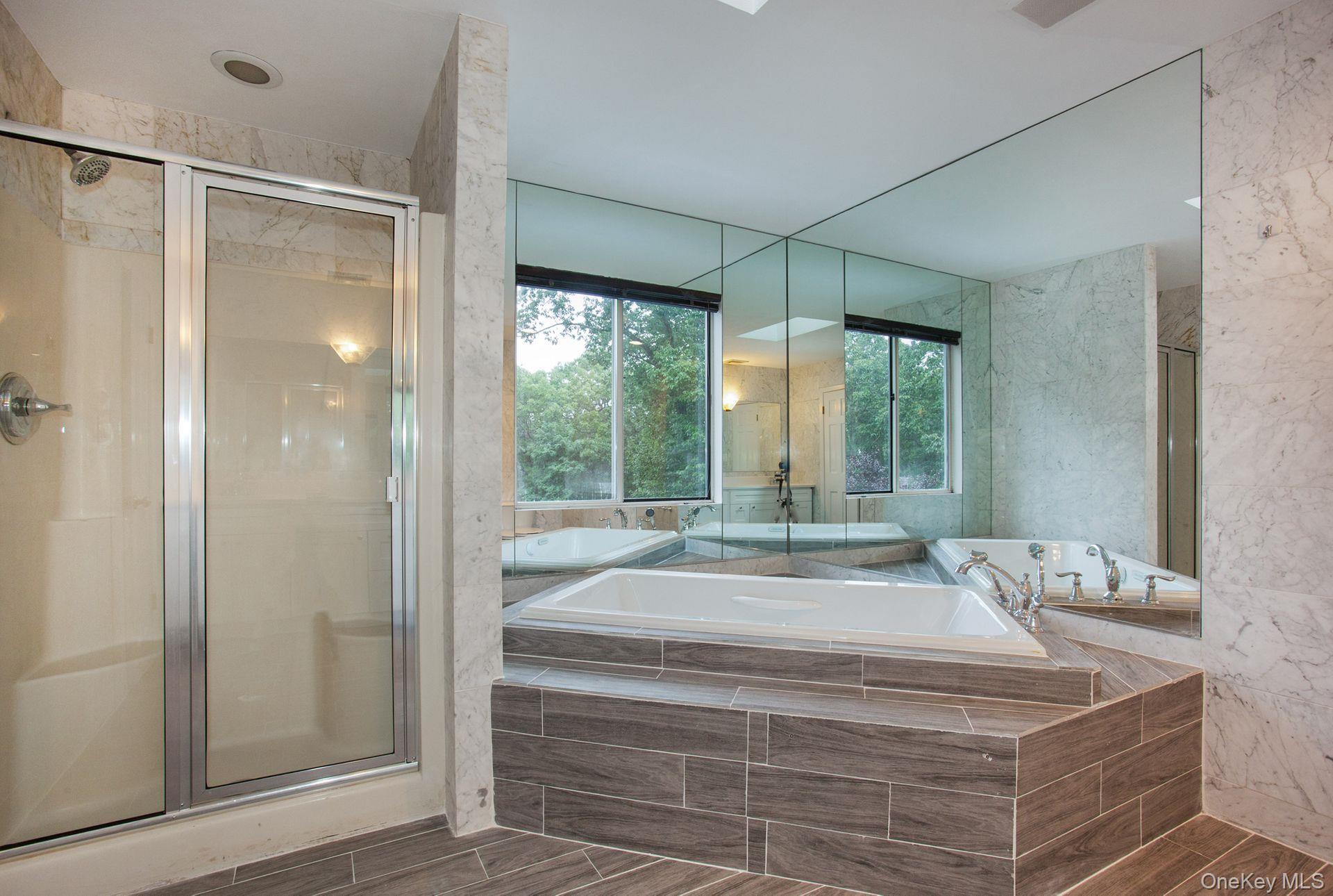 12 North Ridge Road Setauket, NY 11733 - Photo 23 of 34 a spacious bathroom with sink and shower