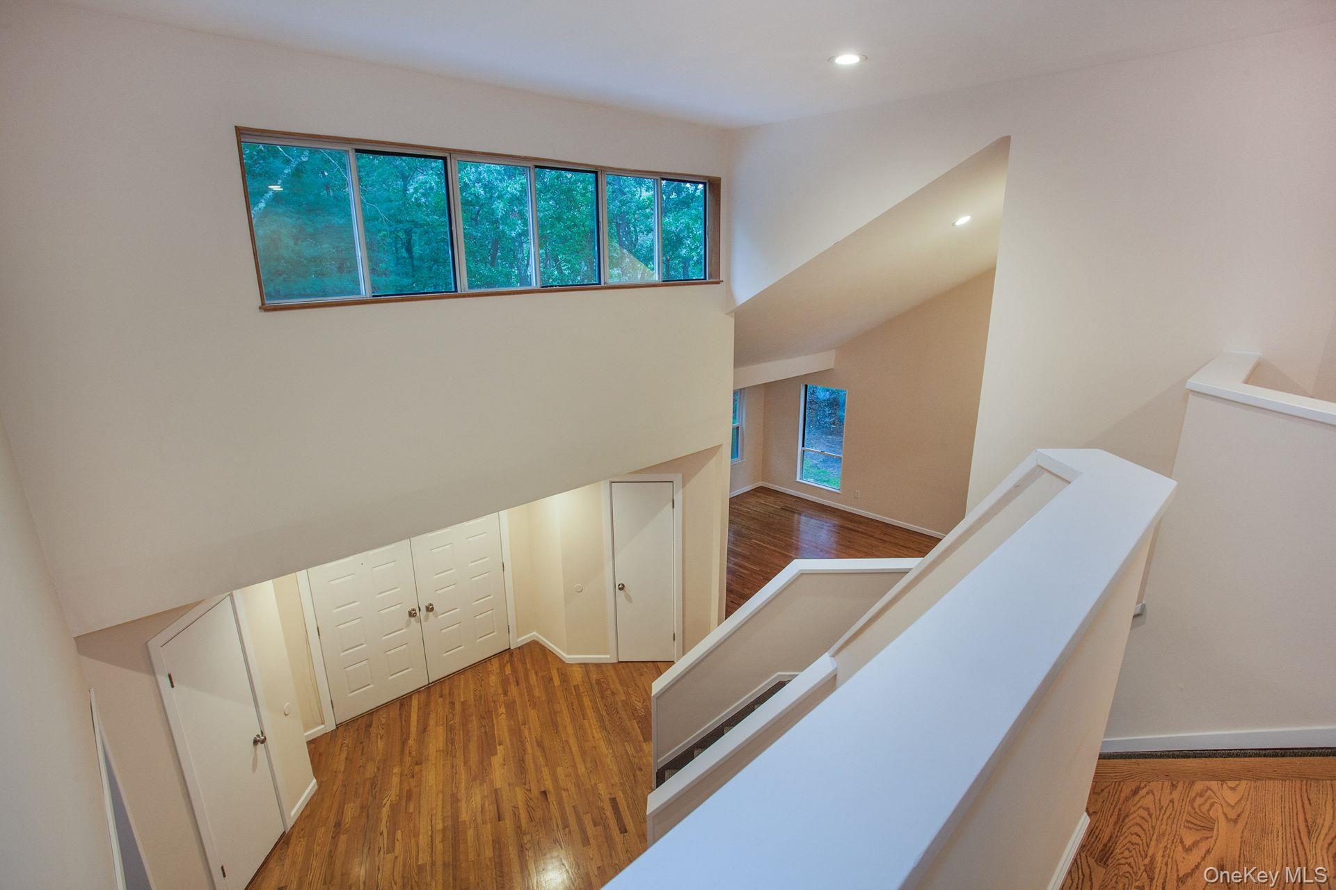 12 North Ridge Road Setauket, NY 11733 - Photo 26 of 34 a view of an entryway with wooden floor