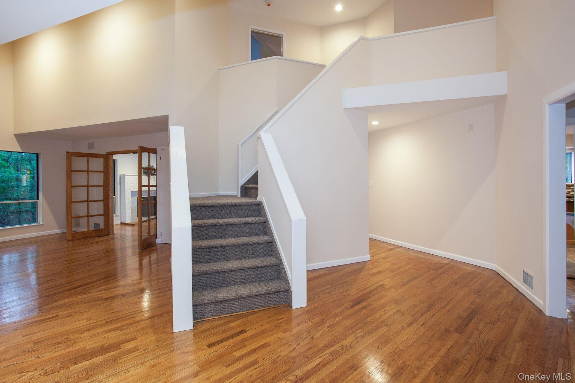 12 North Ridge Road Setauket, NY 11733 - Photo 4 of 34 a view of entryway with wooden floor