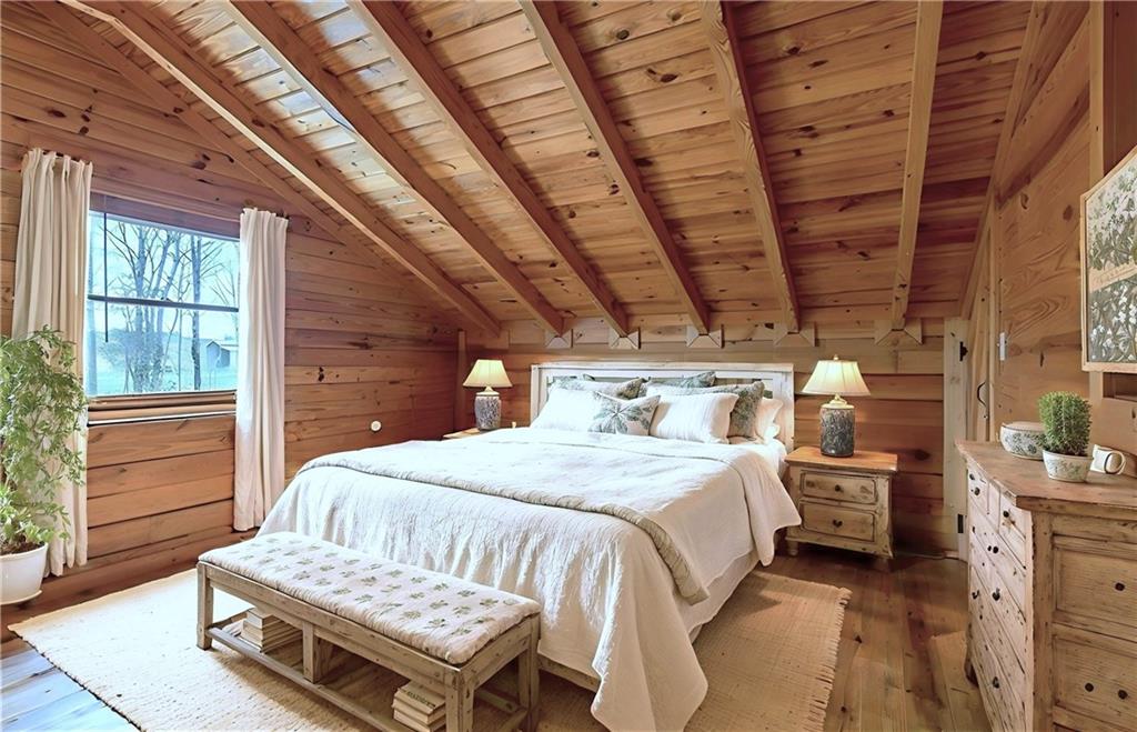 647 Knight Bottom Road Fairmount, GA 30139 - Photo 29 of 62 a bedroom with a bed and a dresser