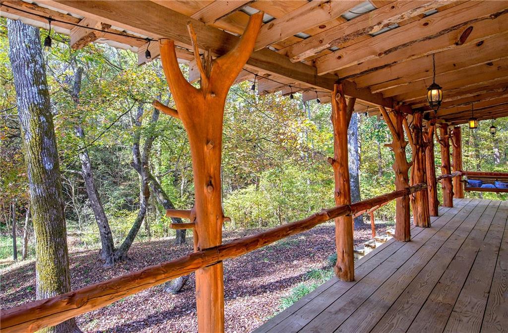 647 Knight Bottom Road Fairmount, GA 30139 - Photo 6 of 62 a view of a room with wooden floor and outdoor space