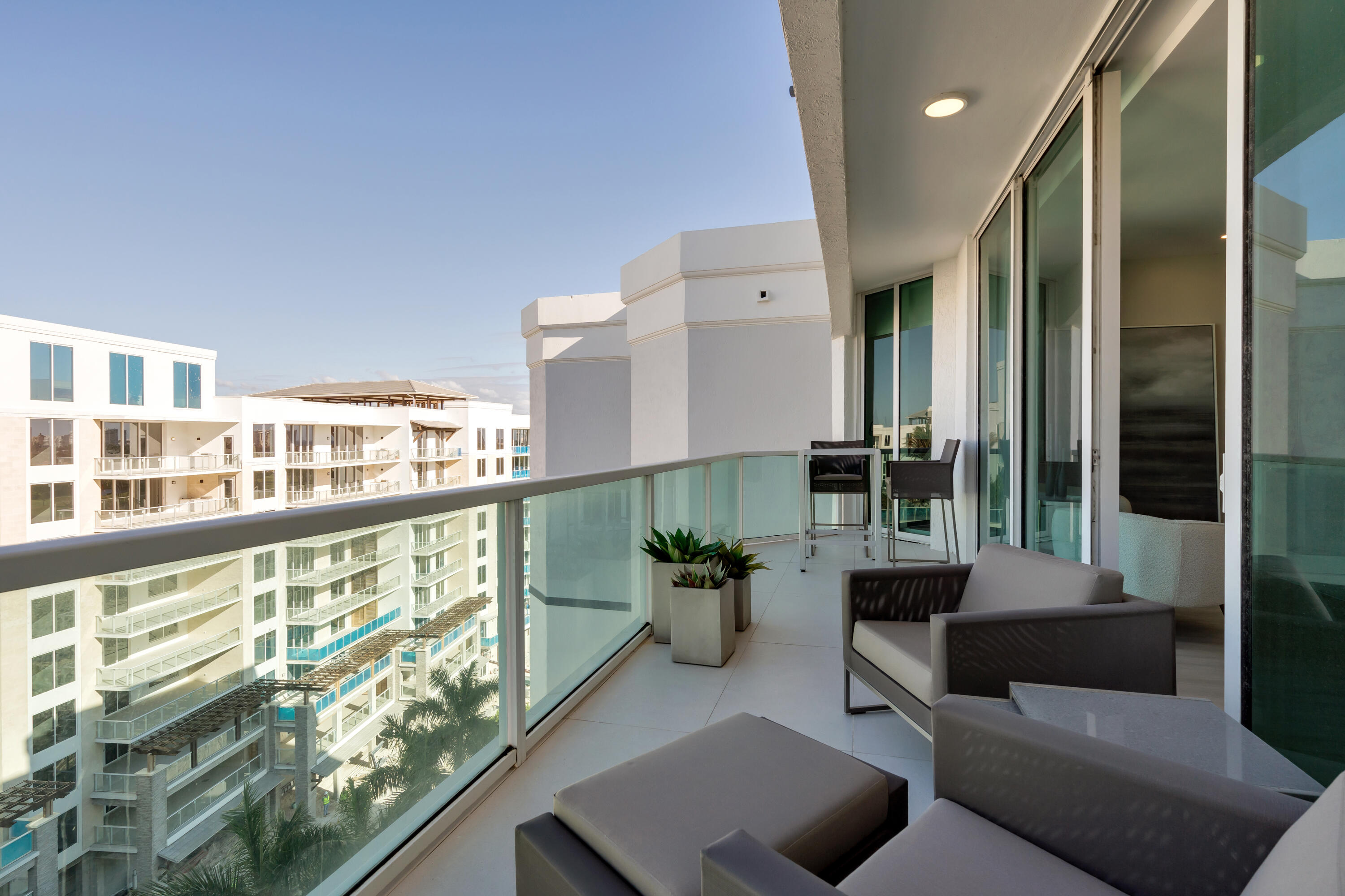 500 Southeast Mizner Boulevard, Unit A902 Boca Raton, FL 33432 - Photo 11 of 23 a living room with furniture and a large window