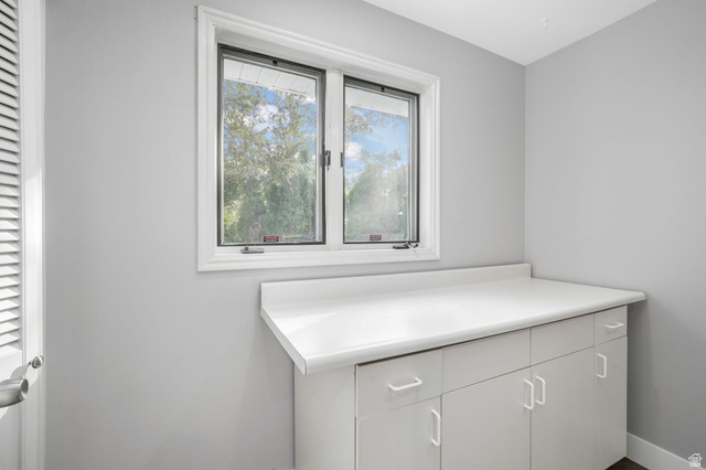 8965 Quail Run Drive Sandy, UT 84093 - Photo 18 of 56 Bathroom featuring vanity and a closet