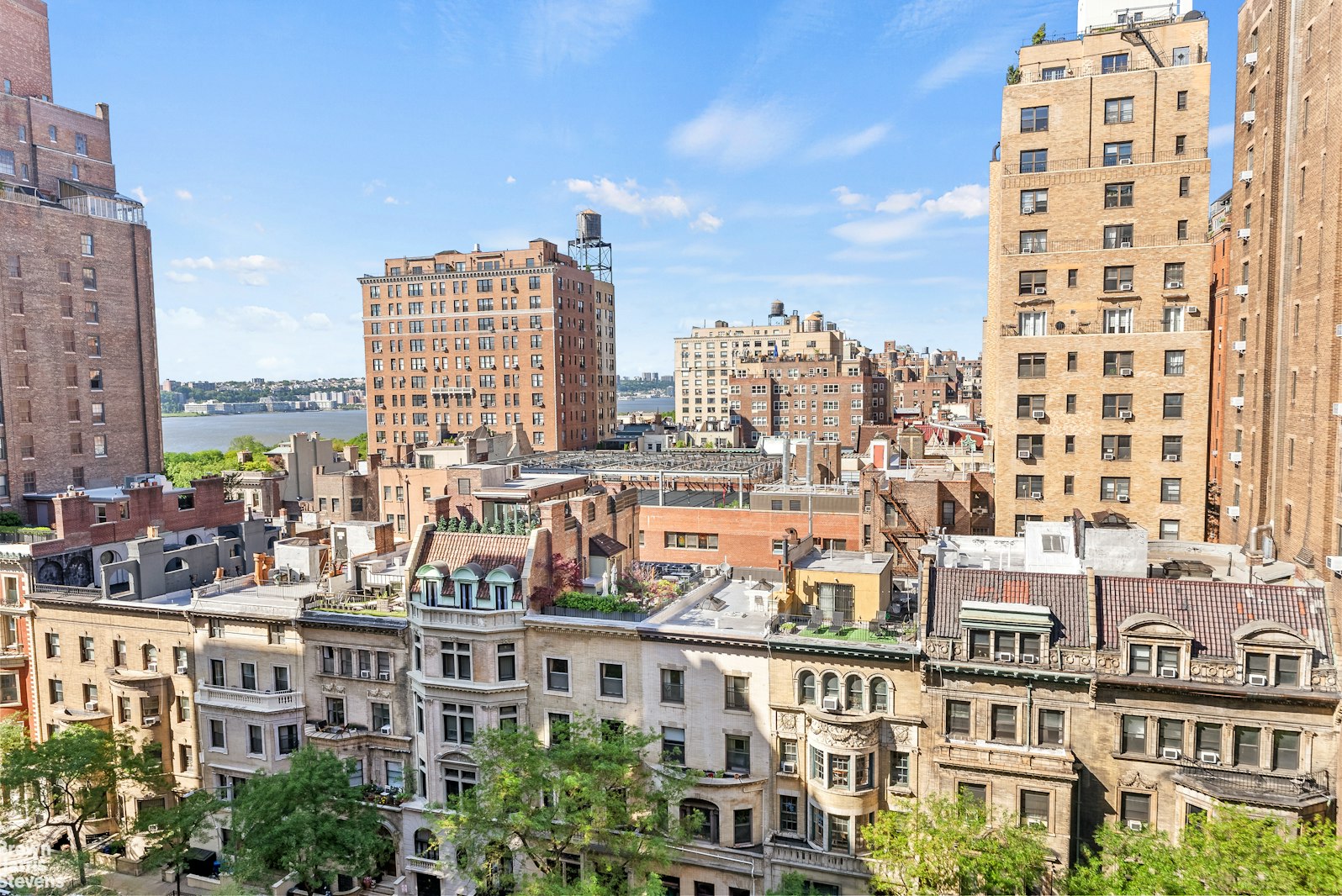 11 Riverside Drive, Unit 11VE Manhattan, NY 10023 - Photo 4 of 14 a view of a city with tall buildings