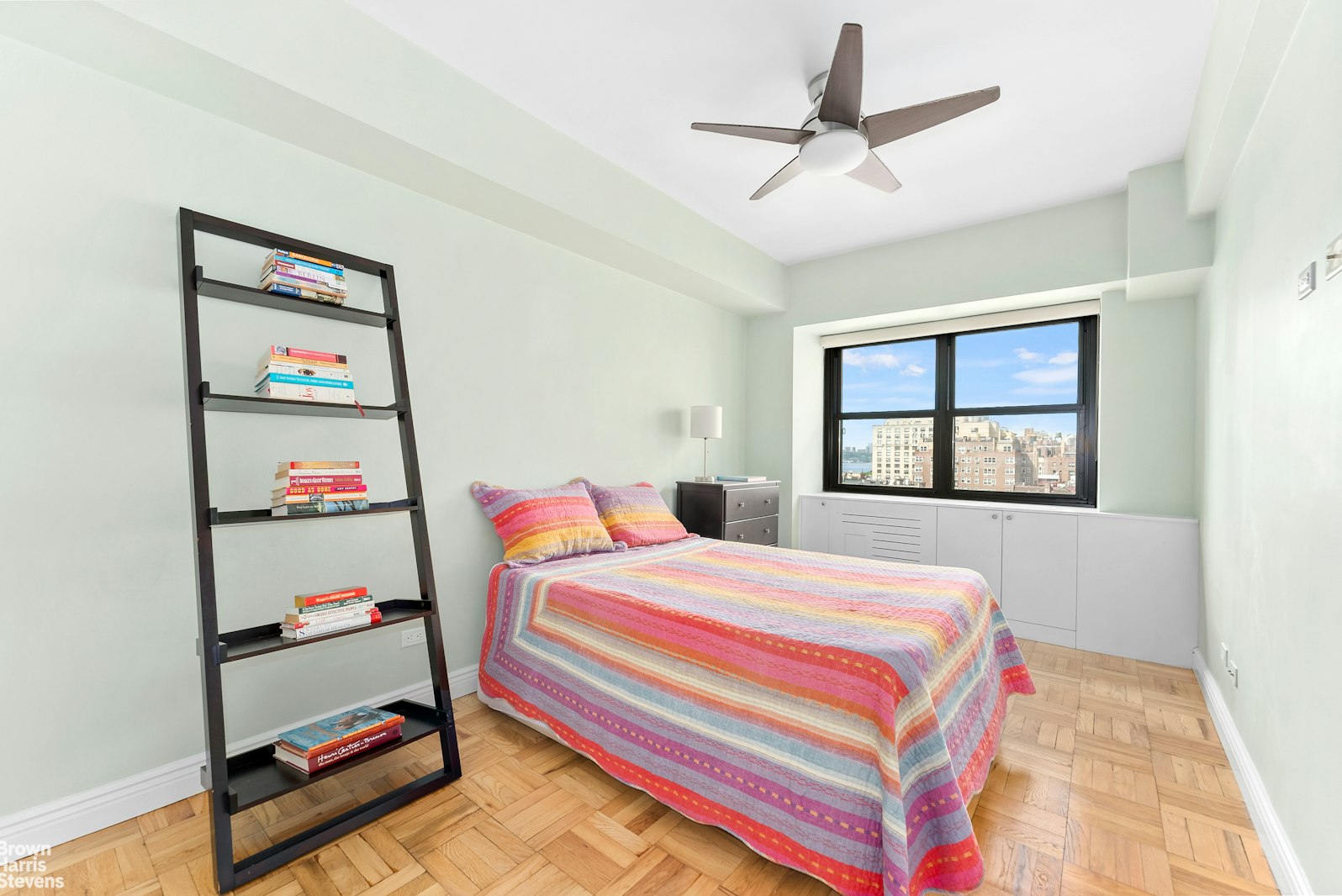 11 Riverside Drive, Unit 11VE Manhattan, NY 10023 - Photo 8 of 14 a bedroom with a bed and a window